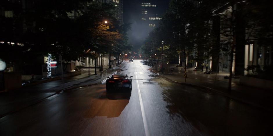 Ryan races down the street towards where a bus is approaching.