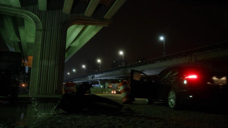 Joe jumps from his car as a drives out-of-control towards a wall.