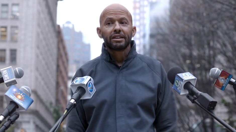 Lex talks in front of the microphones after the trial.