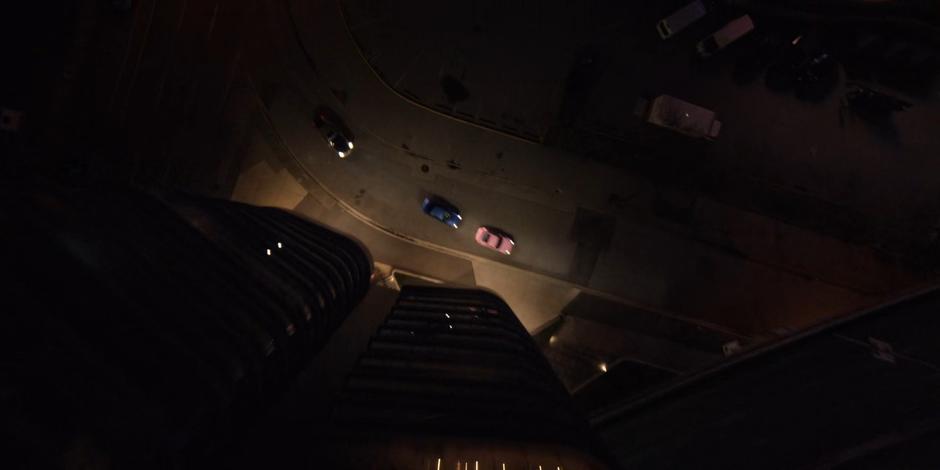 View from high above as the three racers speed down a side road.