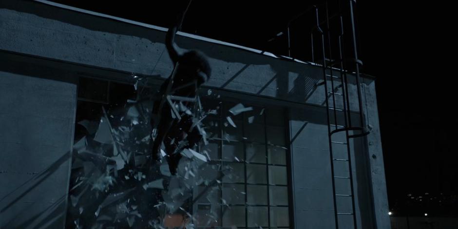 Ryan smashes through the window to escape the Crows.