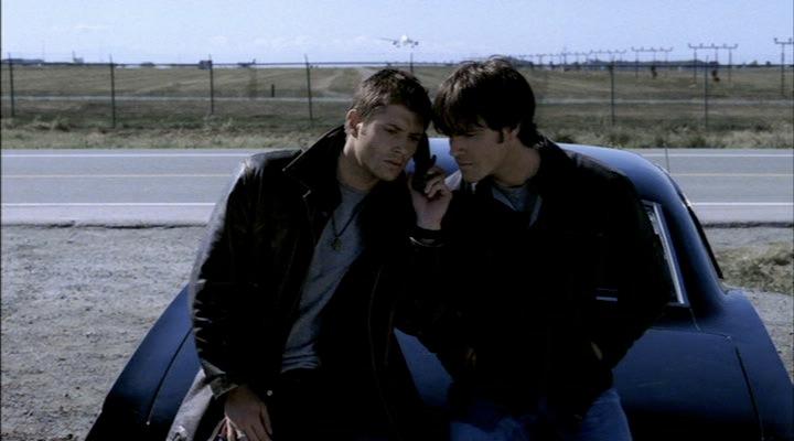 The brothers sit on their car and call their father's cell phone.