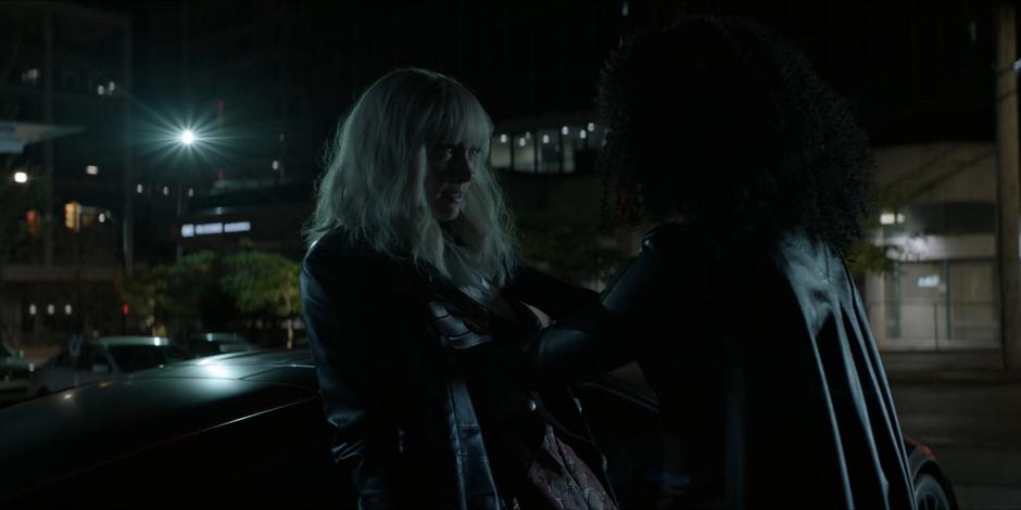 Ryan pushes Alice against a car and tries to convince her to help Kate.