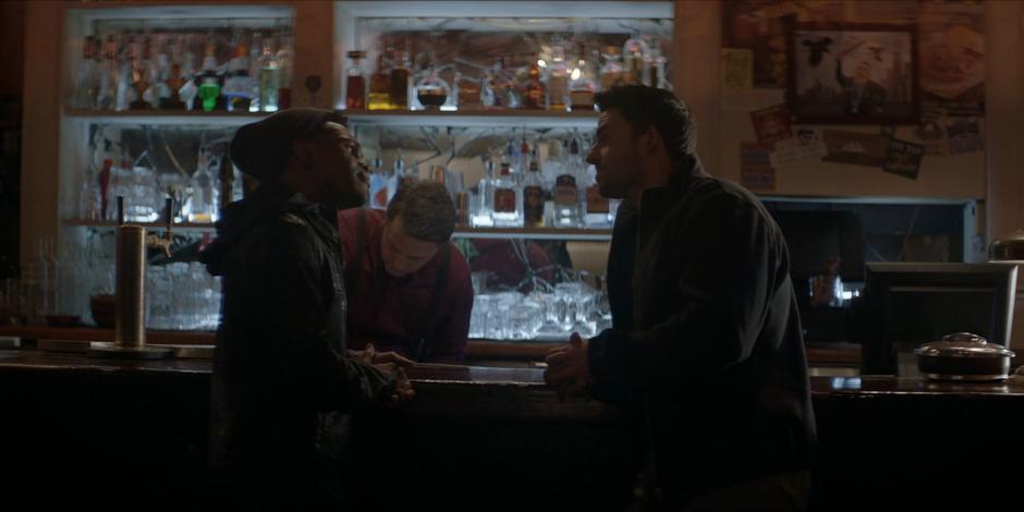 Luke and Tavaroff have a tense conversation at the bar.