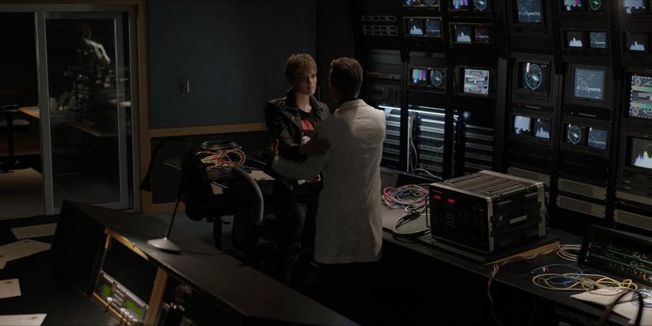 Kate—well, actually Circe—talks to Roman Sionis in the control room.