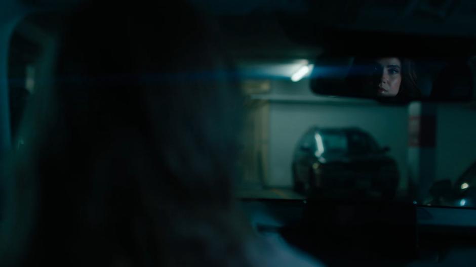 Waverly looks up and sees Abigael in her rearview mirror.