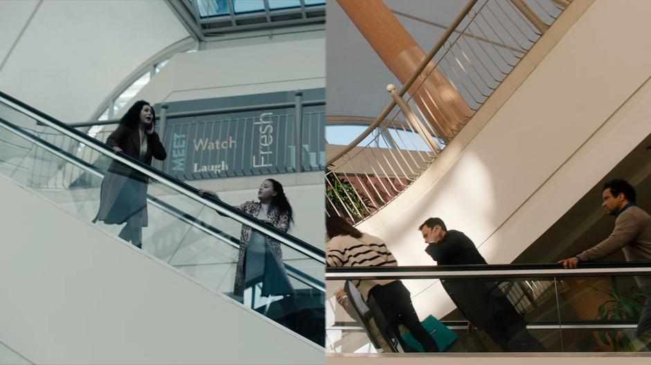 Macy and Maggie run down the escalator in the future while Harry communicates with them from the past in the busy mall.