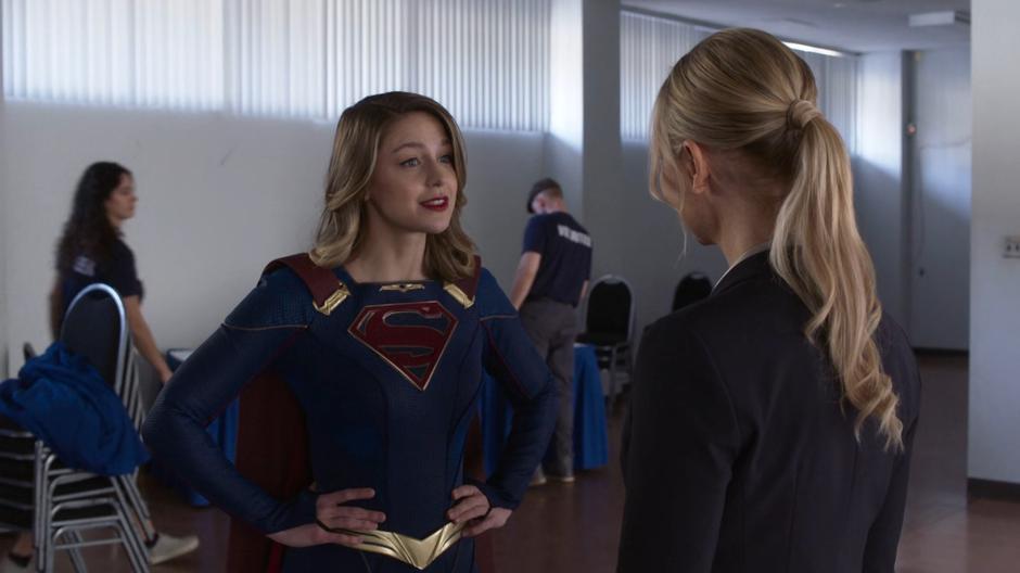 Kara as Supergirl tries to convince Councilwoman Rankin to vote for the affordable housing project.