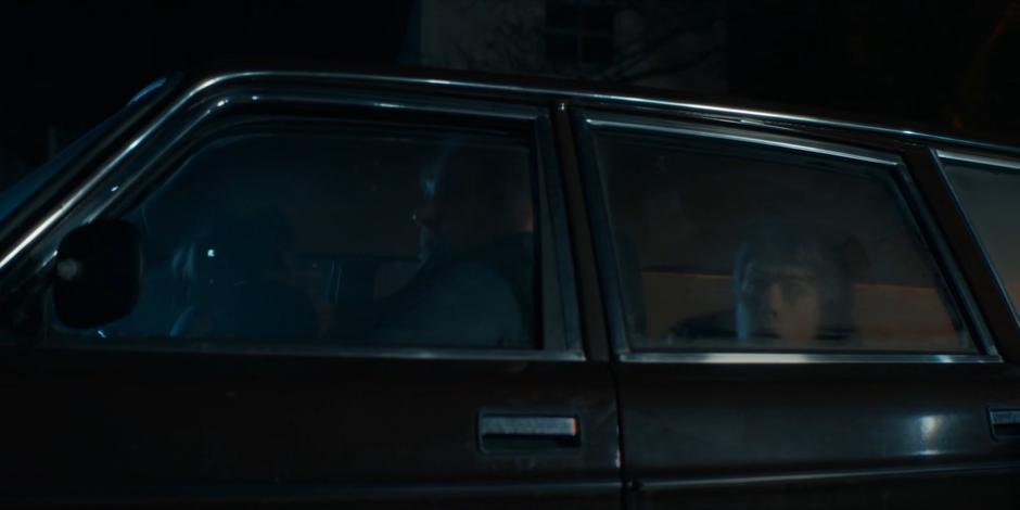 Dan and his parents pop up in the car after the Sontarans walk past.