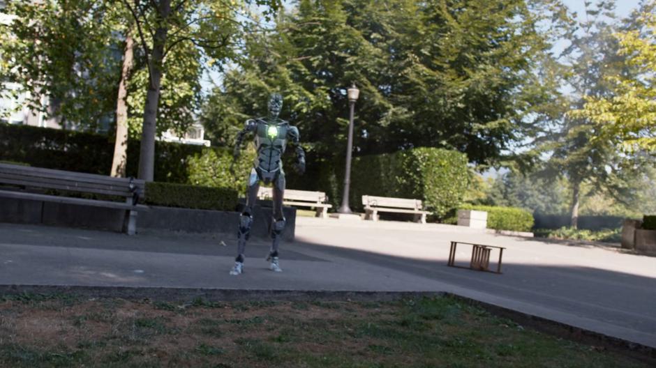 A kryptonite-powered robot runs across the park.