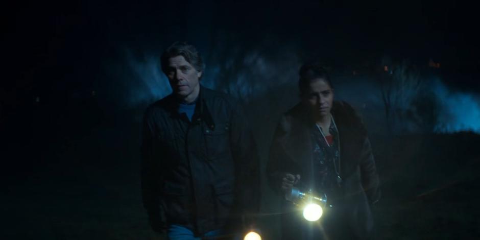 Dan and Yaz continue searching through the foggy field after leaving the others.