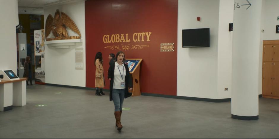 Diane approaches Dan when she sees him once again talking to groups at the museum.