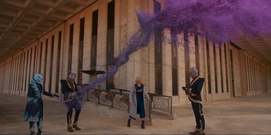 The Doctor watches as the strange purple energy reaches out from Time to destroy Azure and Swarm.