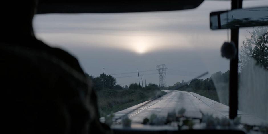 Alice drives the RV towards the sunrise.