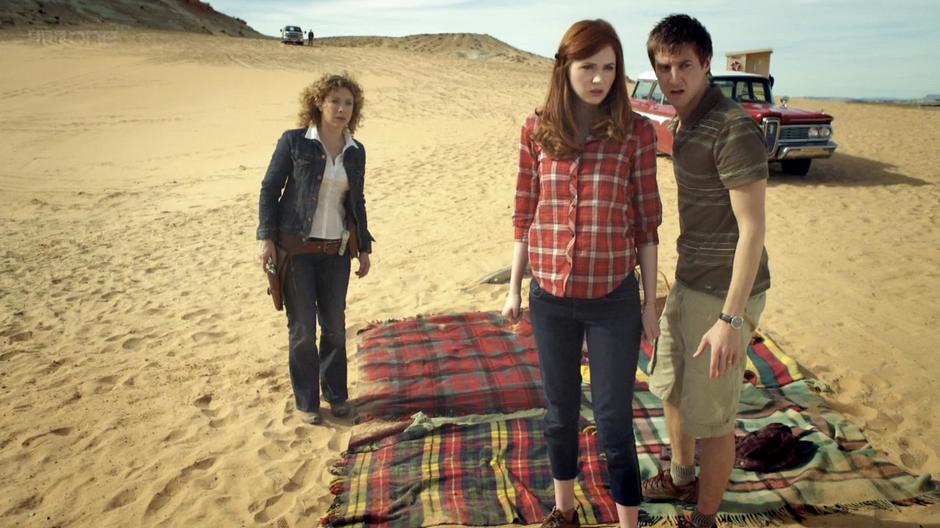 Amy, Rory, and River try to see what is happening with the Doctor and the Astronaut.