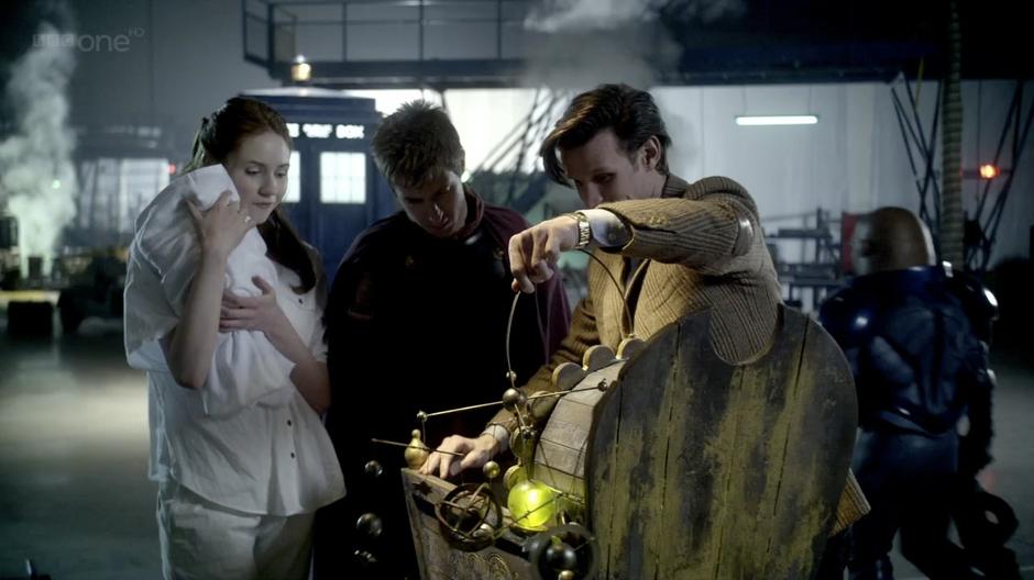 The Doctor shows Amy and Rory his childhood crib.