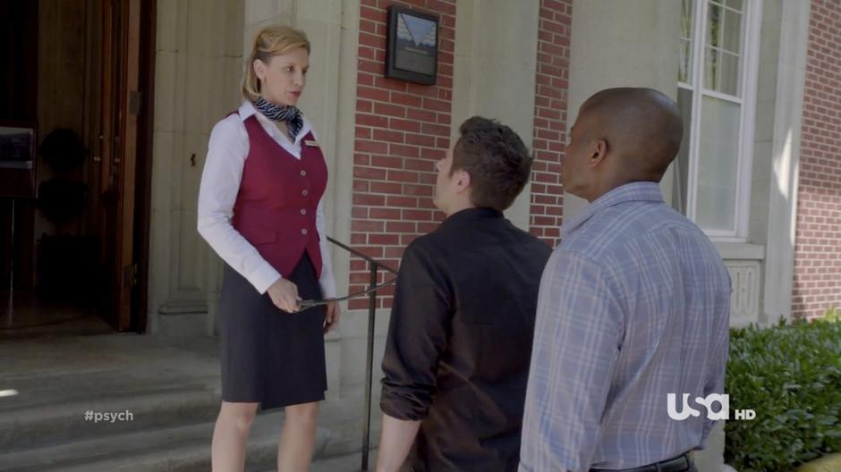 The tour guide, Patience, tells Shawn & Gus the rules of the mansion.