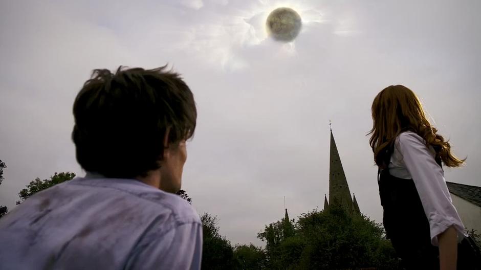 Amy and the Doctor see the sun eclipse.