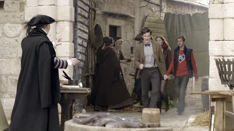 Amy, Rory, and the Doctor walk back to the TARDIS after their adventure.