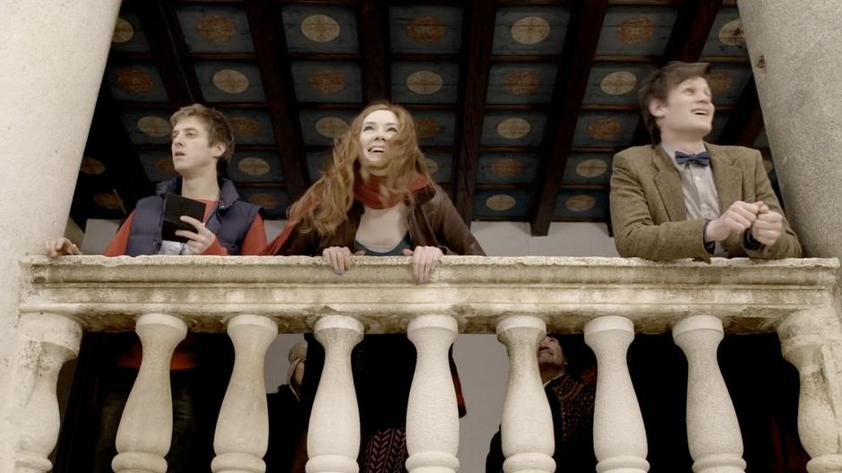 Amy, Rory, and the Doctor watch Guido's confrontation with the vampire girls.