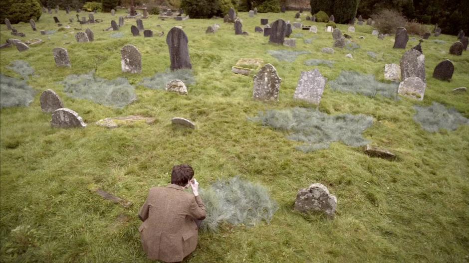The Doctor investigates some strange grass in the church graveyard.