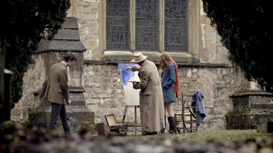 Vincent paints the church while Amy watches intently and the Doctor is bored.