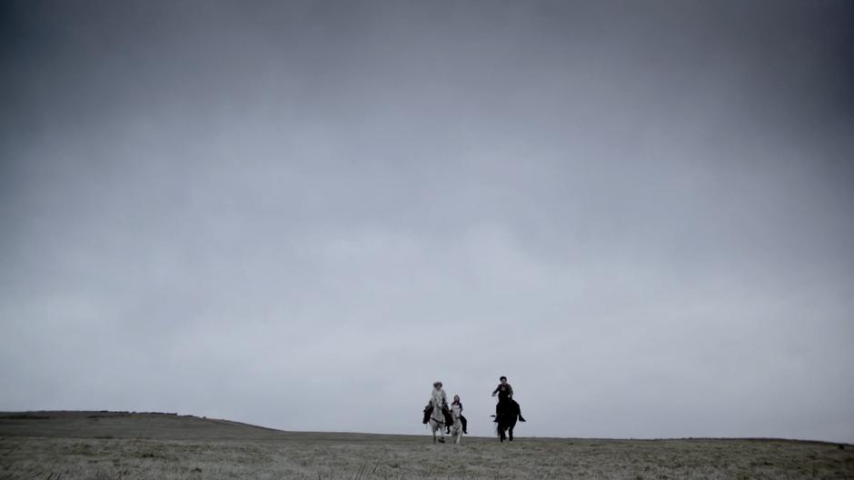 Amy, River, and the Doctor ride towards Stonehenge.