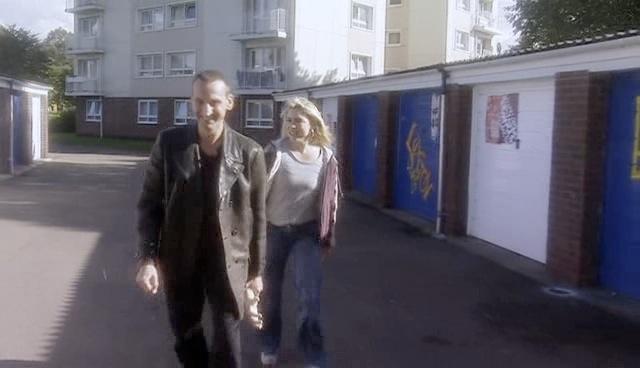 Rose and the Doctor talk while walking away from her flat.