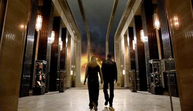 Rose and the Doctor walk into the the main observation room on the space station.
