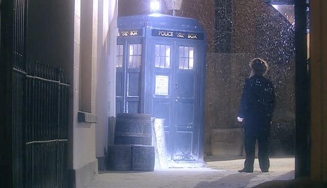 Charles Dickens watches the TARDIS depart.