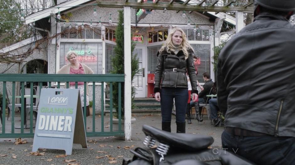 Emma meets August Booth outside the diner for their date.