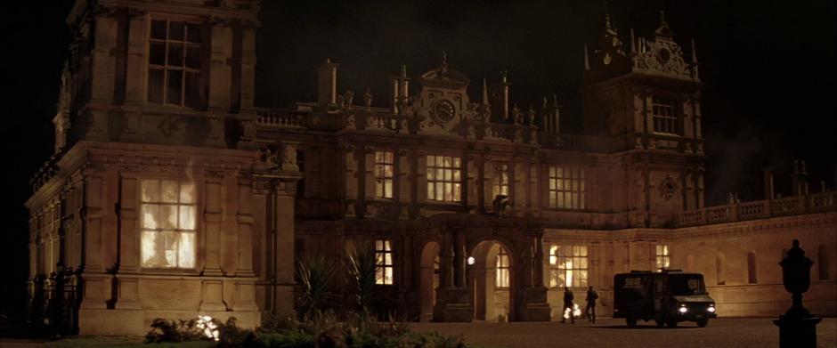The mansion burns to the ground after being torched by Ra's al Ghul,