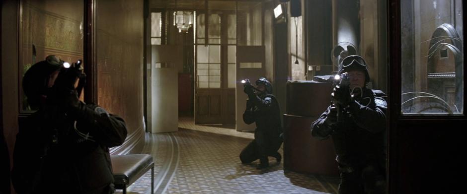 Members of the SWAT team enter the asylum in search of Batman.