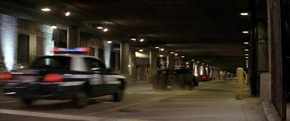 The Batmobile is chased by the police.