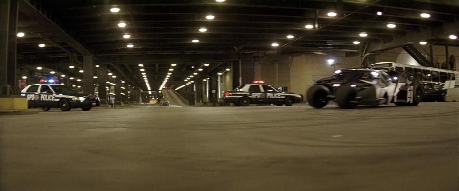 The Batmobile turns around while being chased by the police.