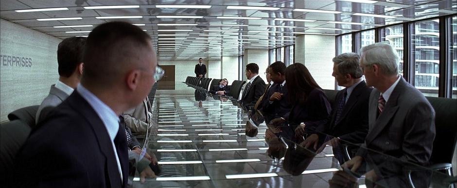 The Wayne Enterprises board of directors meets while Bruce sleeps.