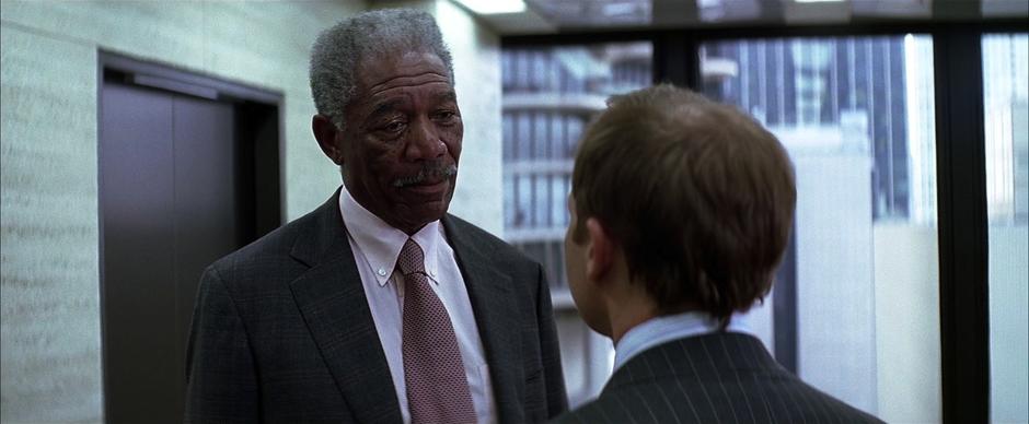 Lucius Fox asks Reese to looking into the numbers of the Lau deal again.