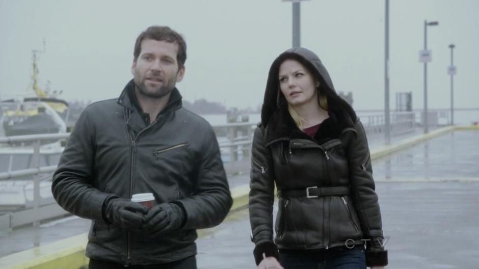 Emma and August Booth walk down the pier.