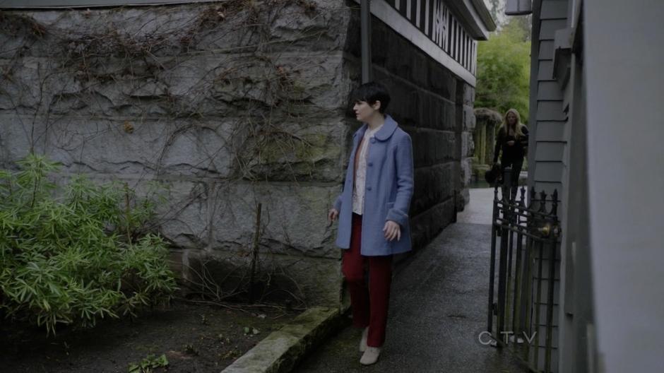 Emma and Mary Margaret come around the corner looking for Jefferson.