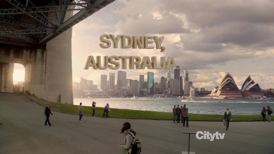 Sally Clark walks to the location of her epicenter across from the Sydney opera house.