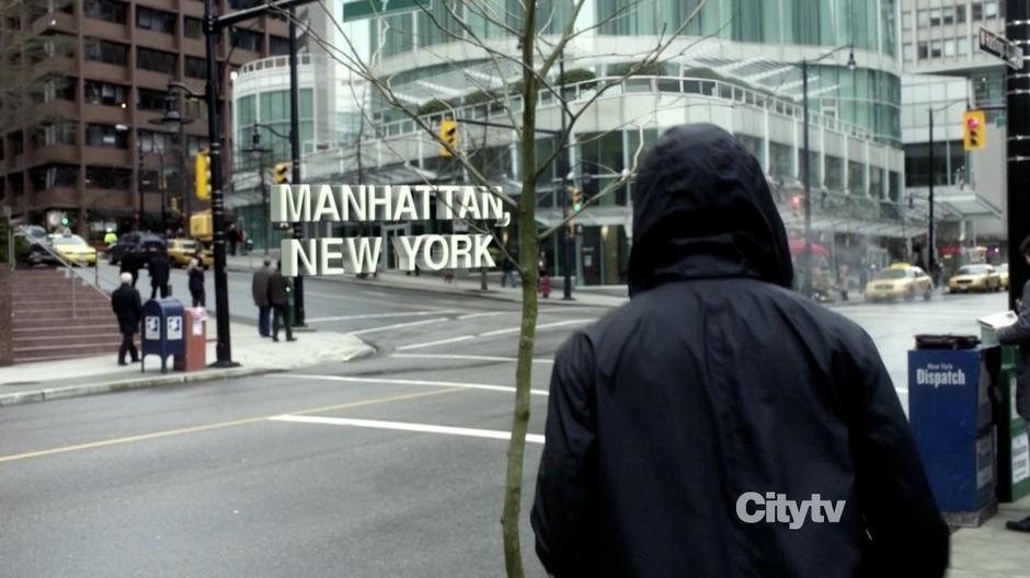 Nick Lane walks into the middle of the street.