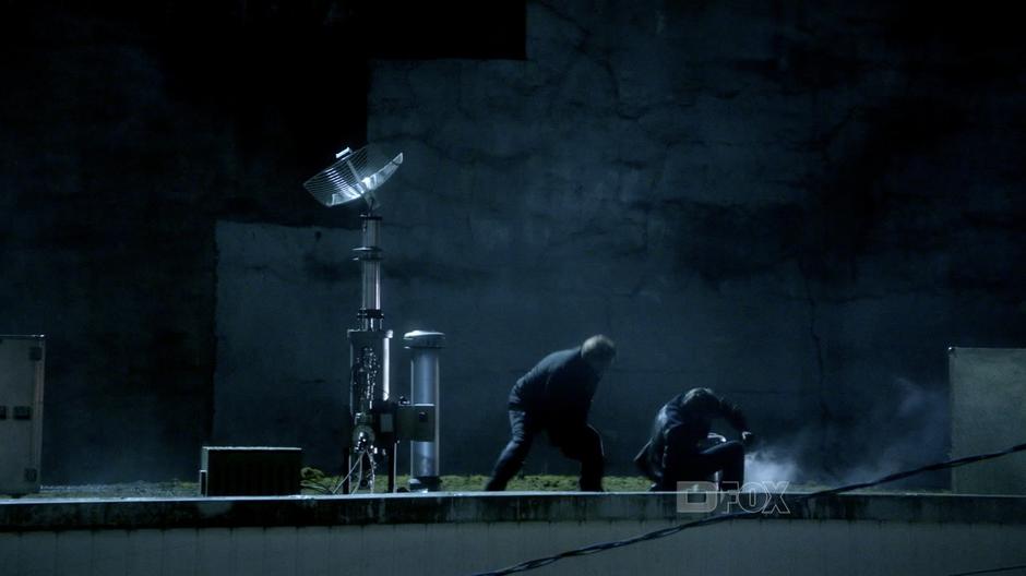 David Robert Jones attempts to kill Peter on the roof near the transmitter.