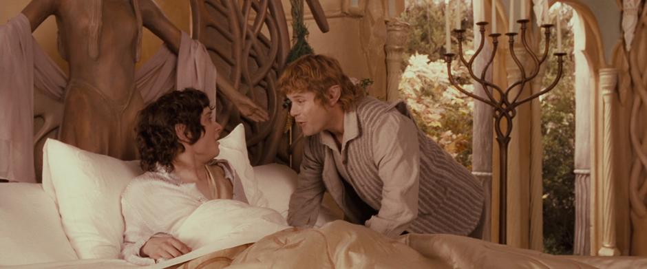 Sam runs to Frodo's bed after Frodo wakes up.