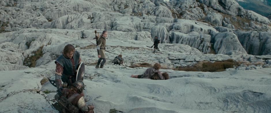 The Fellowship mourns the loss of Gandalf on the slopes of the Dimrill Dale.