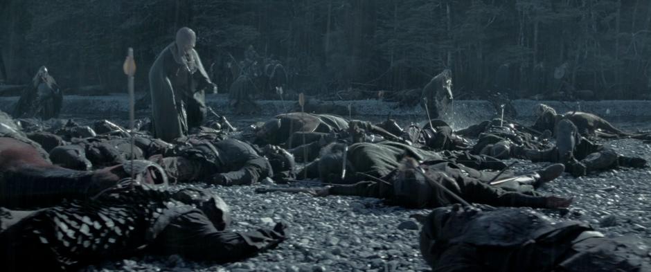 Éomer's soldiers search through the slaughtered men of Rohan.