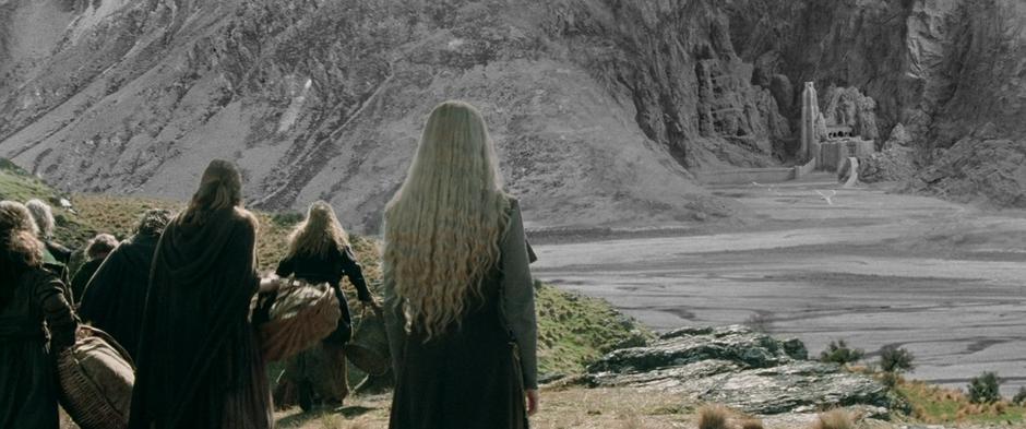 Eowyn looks across the valley to Helm's Deep at the head of the refugees.