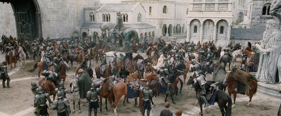 The remaining forces from Osgiliath arrive through the main gate of Minas Tirith.