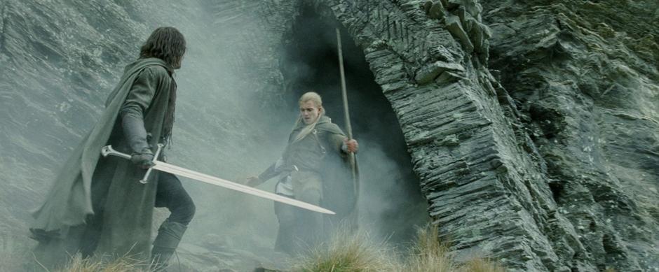Legolas comes out of the cave after Aragorn.