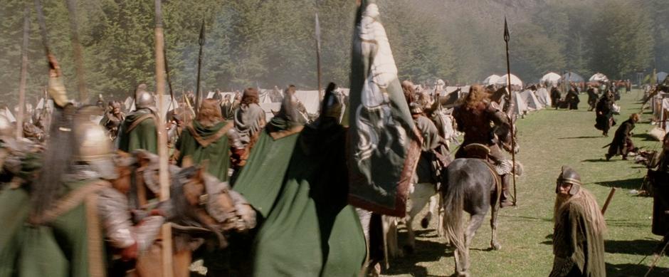 Theoden's party rides through the armies of Rohan.