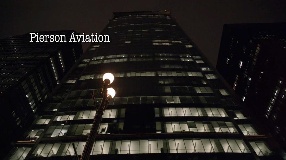 Establishing shot of the Pierson Aviation tower from street level.